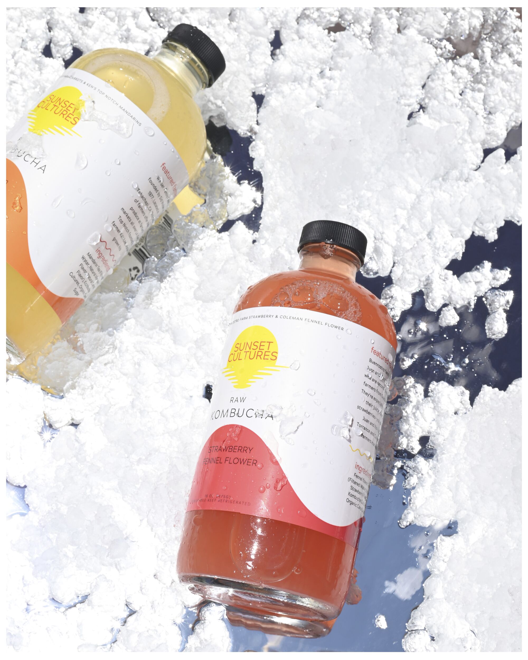 Two bottles of Sunset Cultures kombucha
