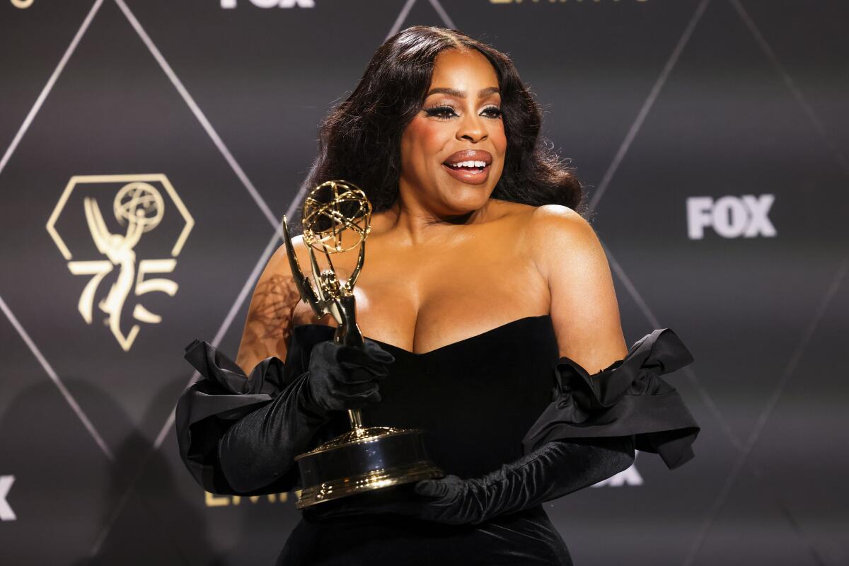 Niecy Nash wins for supporting actress in a limited series, anthology series or drama.