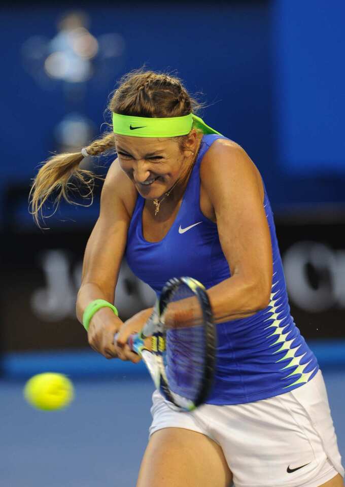 Victoria Azarenka connects on a backhand return during a 6-3, 6-0 victory against Maria Sharapova in the women's final of the Australian Open on Saturday night in Melbourne.