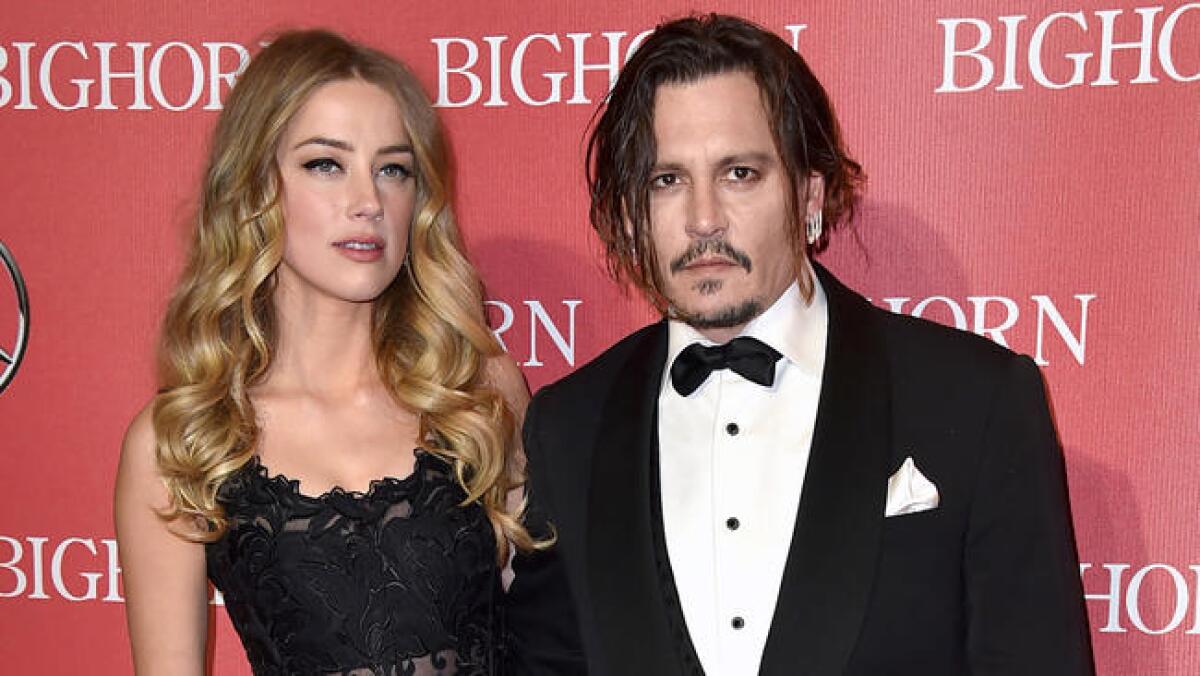 Amber Heard and Johnny Depp at the Palm Springs International Film Festival Awards Gala in January 2016.