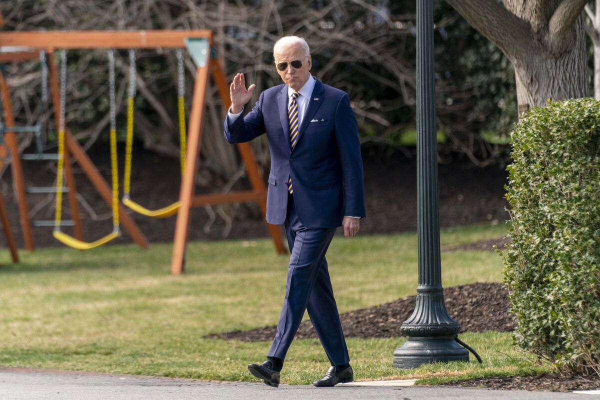 President Joe Biden walks towards Marine One on the South Lawn of the White House on Tuesday.