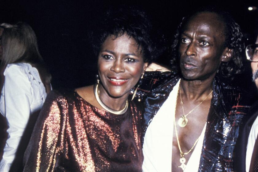 Cicely Tyson and Miles Davis during The 28th Annual GRAMMY Awards at Shrine Auditorium in Los Angeles.