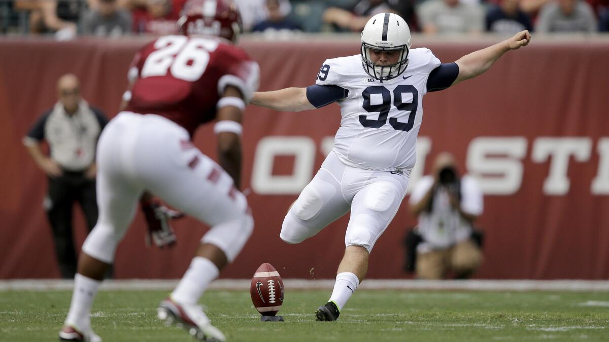 Penn State's Joey Julius kicks off during a game against Temple earlier this season.
