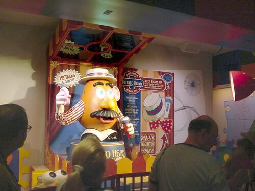 A 5-foot-tall Mr. Potato Head animatronic entertains theme park guests in line for the Toy Story Mania attraction at Disney's Hollywood Studios. The park was previewing the attraction for annual passholders only.