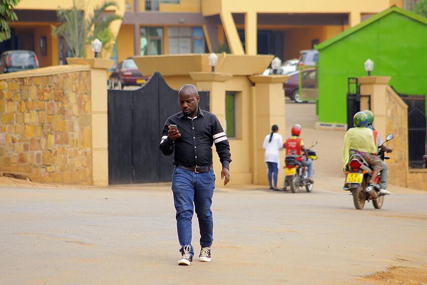 Albert Nabonibo, a well-known gospel singer in Rwanda, walks out of the Zion Temple Celebration Center in Kigali.