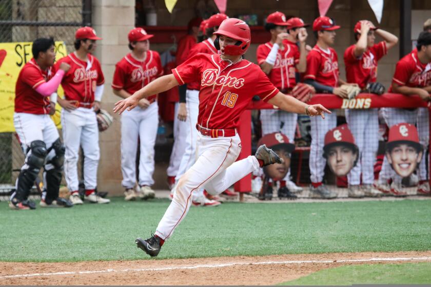 Cathedral Catholic's Vincent Venverloh (19) runs to home base during a game against St. Augustine at Cathedral Catholic High on Friday, May 10, 2024. The Dons beat the Saints 5-0.