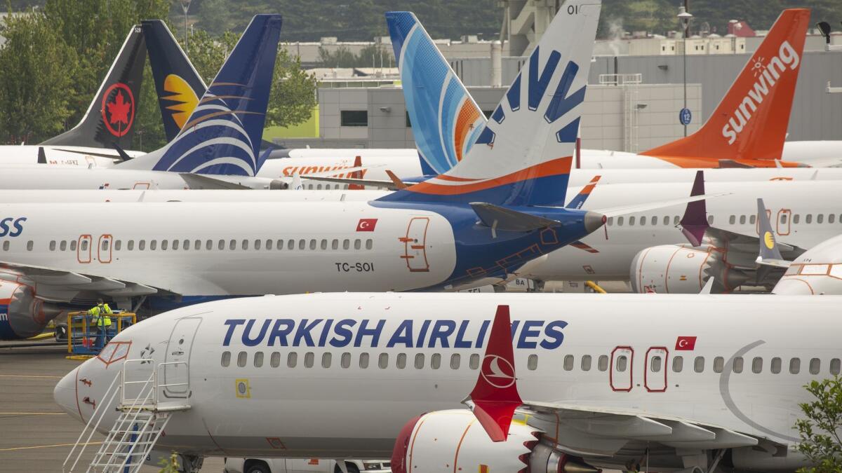 Boeing 737 Max airplanes sit parked at a Boeing facility adjacent to King County International Airport, known as Boeing Field, on May 31 in Seattle.