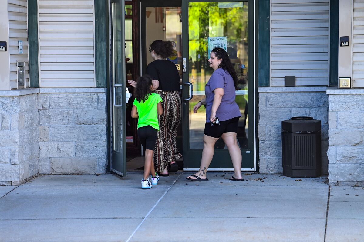 Visitors enter the Patmos Library