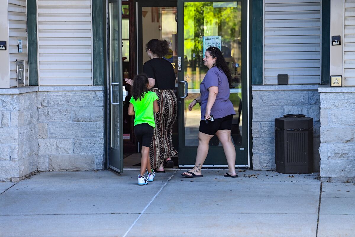 Visitors enter the Patmos Library 