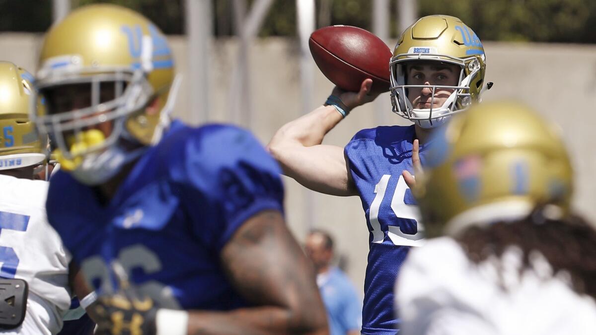 UCLA quarterback Matt Lynch throws downfield at Drake Stadium on April 21, 2018.