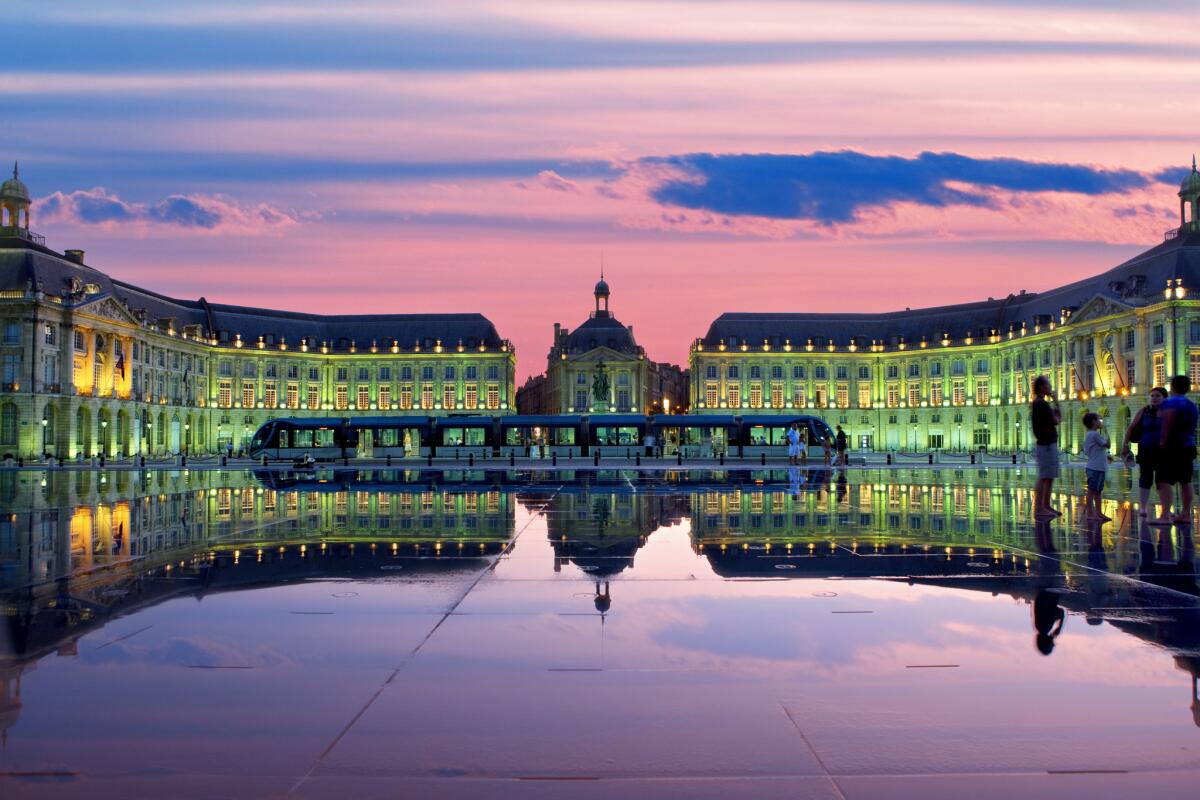 Ornamental water feature in Bordeaux at dusk.