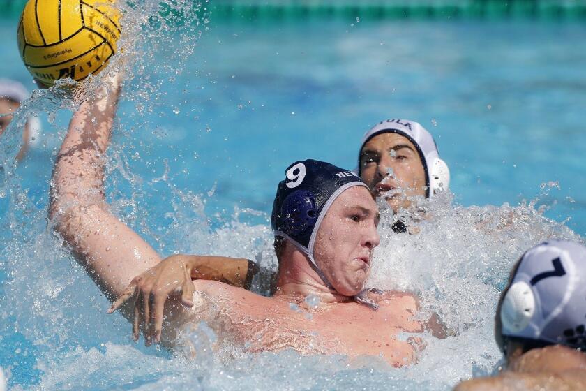 Newport Harbor High's Ike Love (9) scores against Loyola during the first half in the South Coast Tournament semifinals at Newport Harbor High on Saturday, Sept. 22.