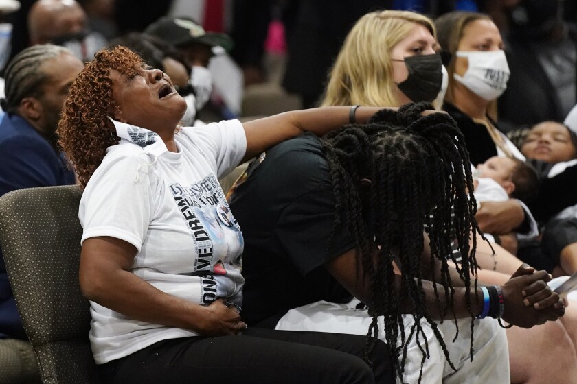 Family members react during the funeral for Andrew Brown Jr.