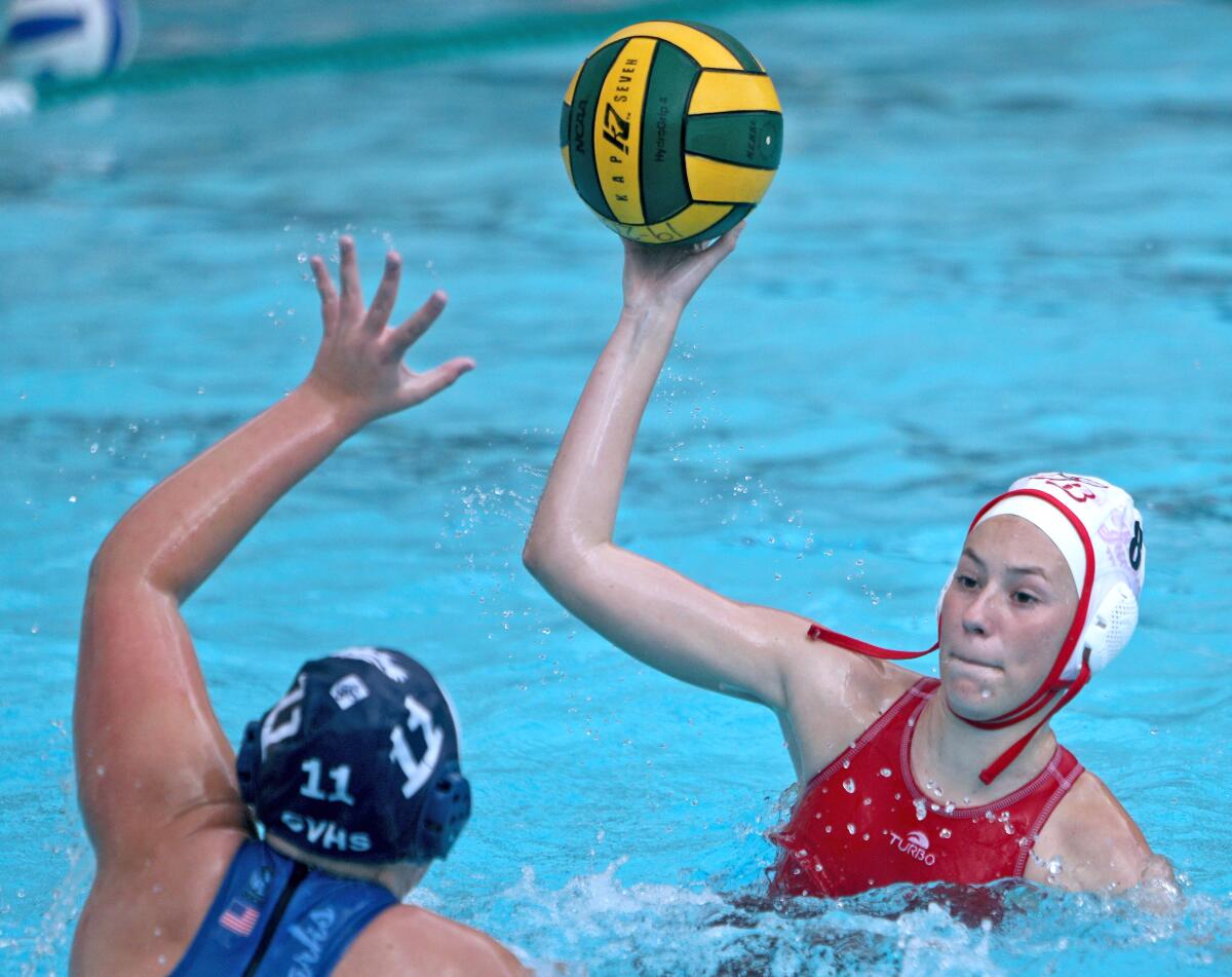 Burbank Burroughs girls water polo player Chrissy Vlick takes a shot on goal in away game vs. Crescenta Valley in La Crescenta on Thursday, Jan. 16, 2020.
