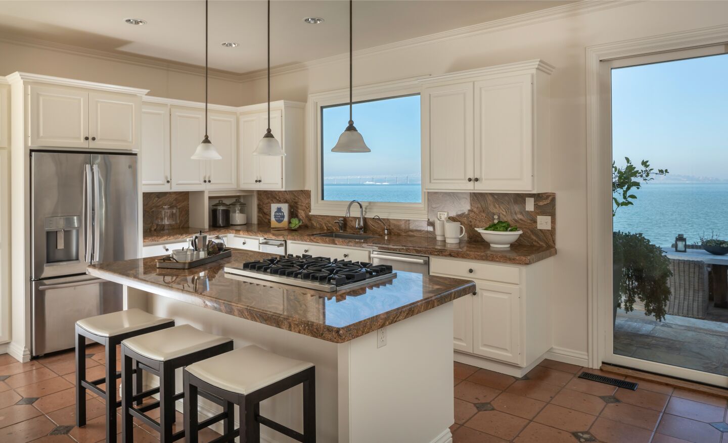 The kitchen with windows overlooking the bay.
