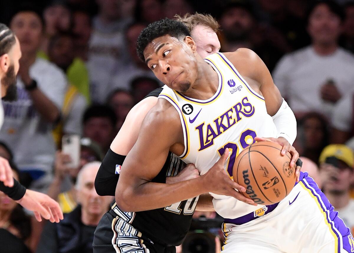 Lakers forward Rui Hachimura drives to the basket against the Grizzlies in the first quarter.