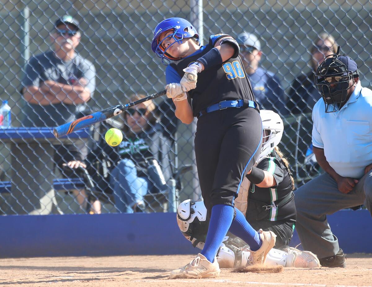 Makenzie Butt (98) of Fountain Valley hits a game tying RBI single.
