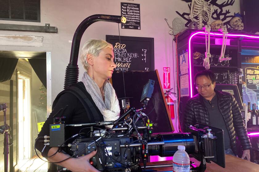 Halyna Hutchins working on the set of the 2020 film “Archenemy”