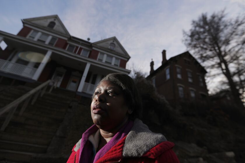 DUBUQUE, IOWA. - DEC. 9, 2019. Lynne Sutton is a housing advocate and former member of the Dubuque City Council. She fights landlords to get them to improve blighted rentals in the city center, where the vast majority of low-income people of color, most of them relatively new arrivals, are clustered. She believes the city is not doing enough to combat inequality or help people living in substandard voucher-subsidized housing. (Luis Sinco/Los Angeles Times)