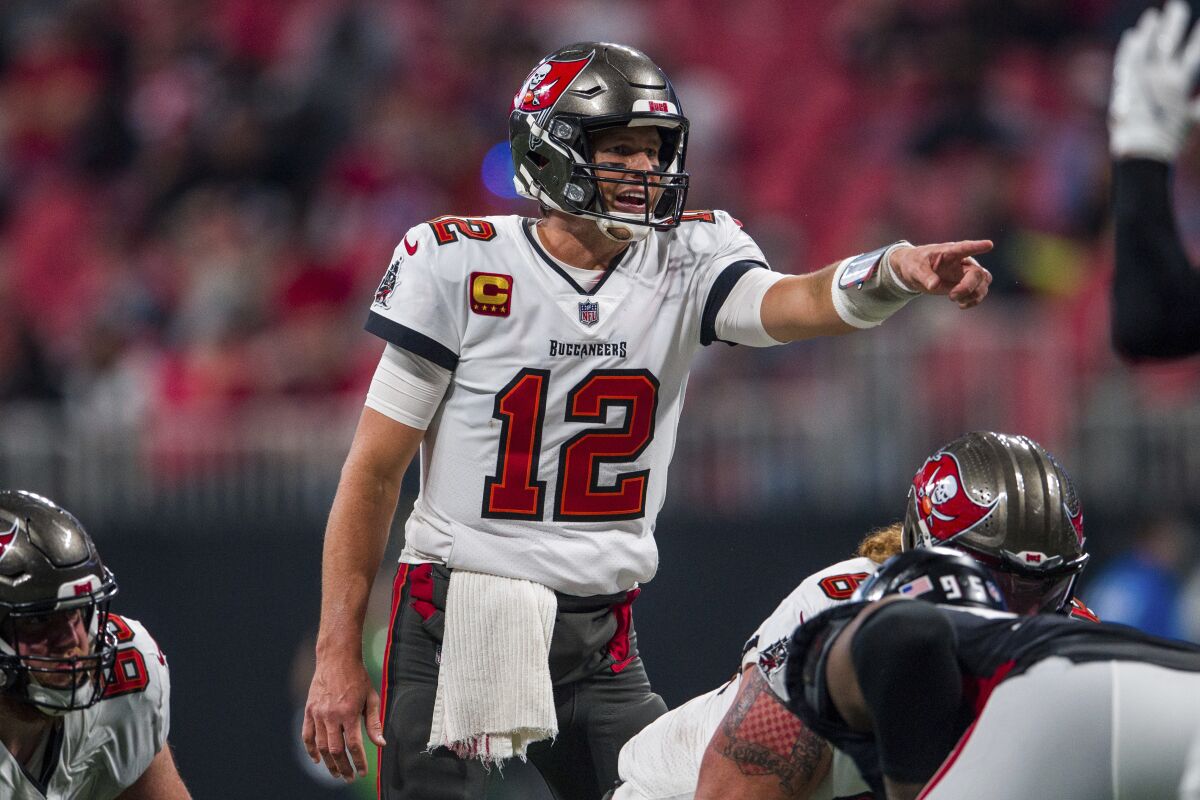 Tampa Bay Buccaneers quarterback Tom Brady signals before a snap against the Atlanta Falcons on Sunday.