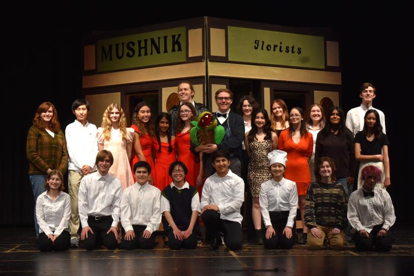 The cast of “Little Shop of Horrors” at Del Norte High School.