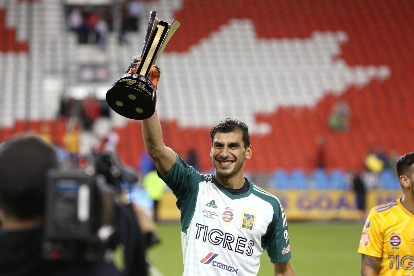 Tigres UANL's Argentinian goalkeeper Nahuel Guzman #1 celebrates his team win 3-1 against Toronto FC during the Campeones Cup at BMO Field in Toronto, Ontario, September 19, 2018. (Photo by Lars Hagberg / AFP)LARS HAGBERG/AFP/Getty Images ** OUTS - ELSENT, FPG, CM - OUTS * NM, PH, VA if sourced by CT, LA or MoD **