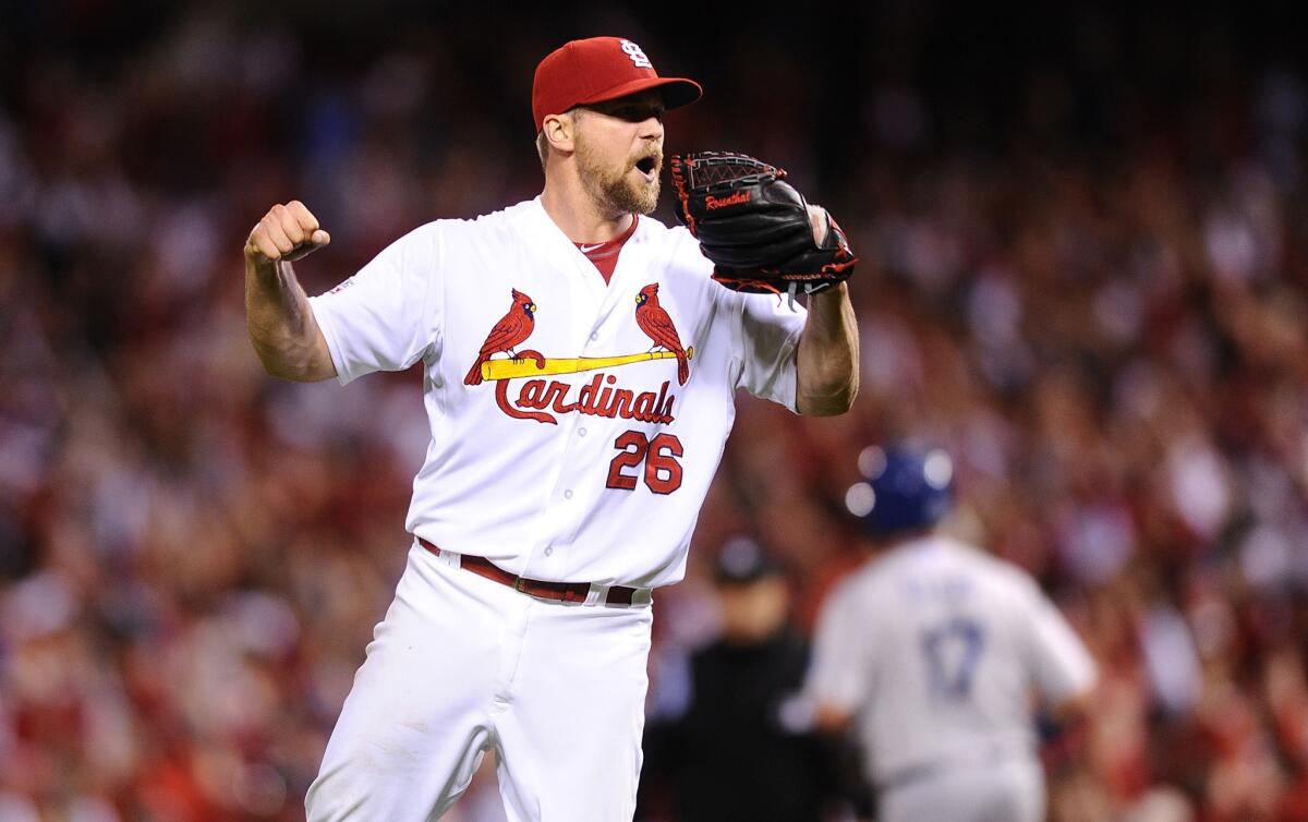 St. Louis Cardinals pitcher Trevor Rosenthal celebrates after the final out of the Cardinals' 3-1 win over the Dodgers in Game 3 of the NLDS on Monday.