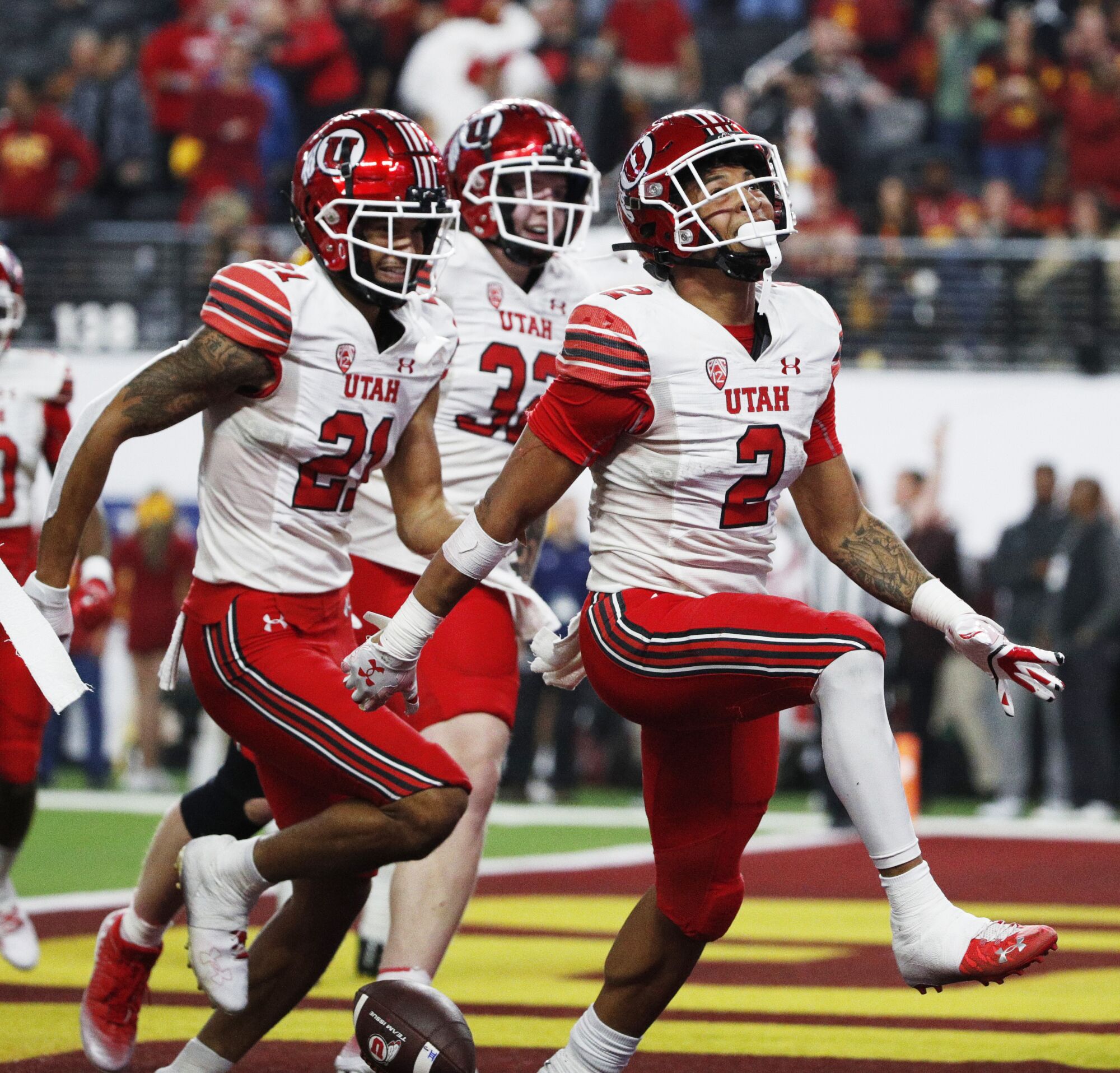 Utah Utes running back Micah Bernard (2) scores late in the fourth quarter to seal the win.