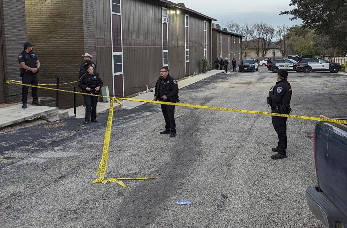 Cordoned-off street where two bodies were discovered in San Antonio