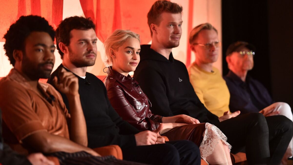 Actors Donald Glover, left, Alden Ehrenreich, Emilia Clarke, Joonas Suotamo, Paul Bettany and director Ron Howard at the "Solo: A Star Wars Story" news conference.