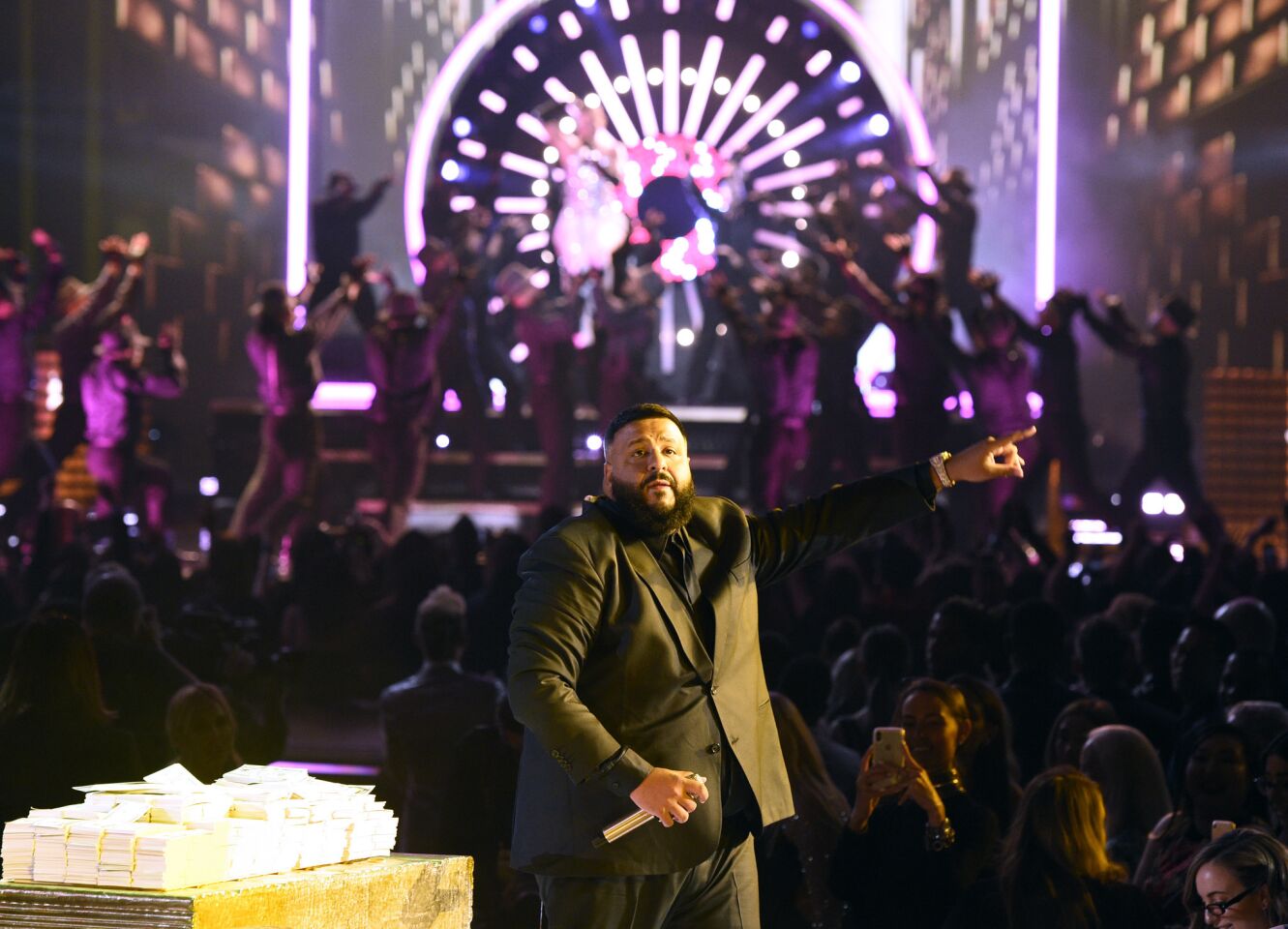 DJ Khaled performs "Dinero," with Jennifer Lopez in the background.