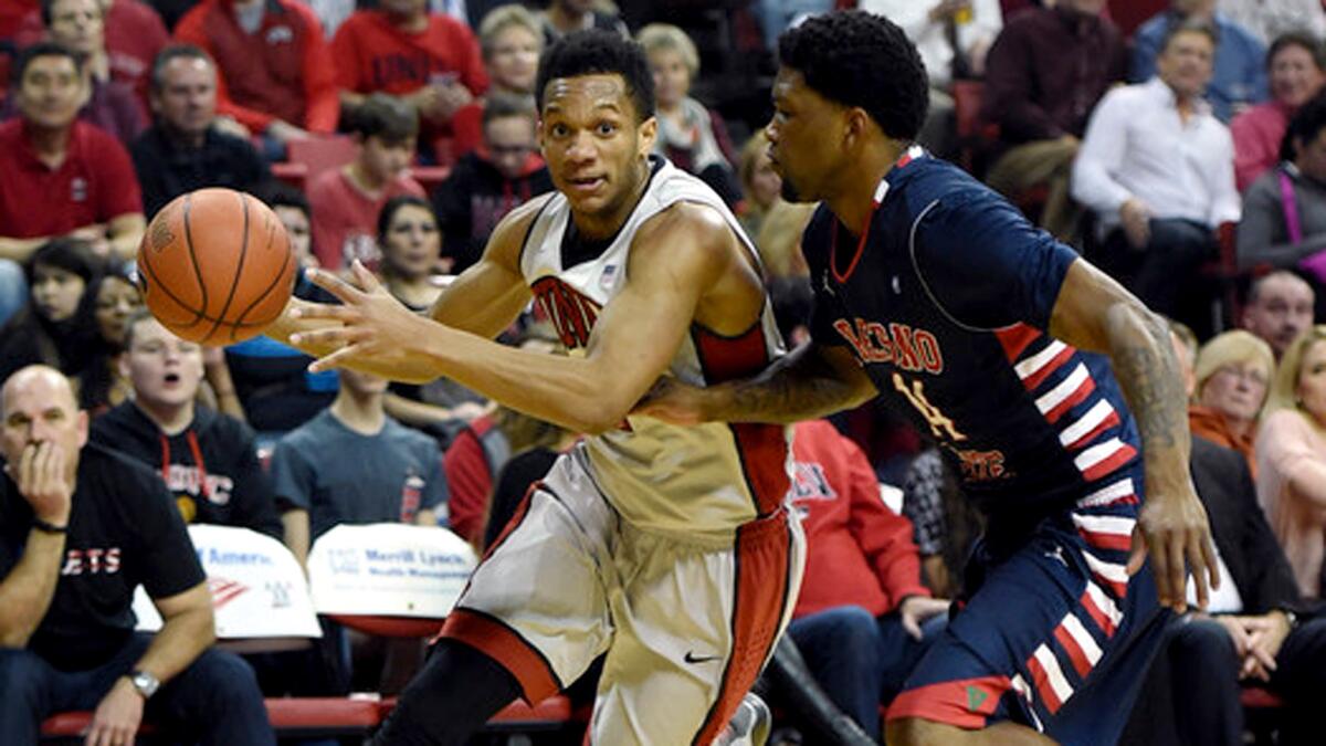 UNLV guard Rashad Vaughn drives against Fresno State guard Julien Lewis during a Mountain West Conference game on Feb. 10.