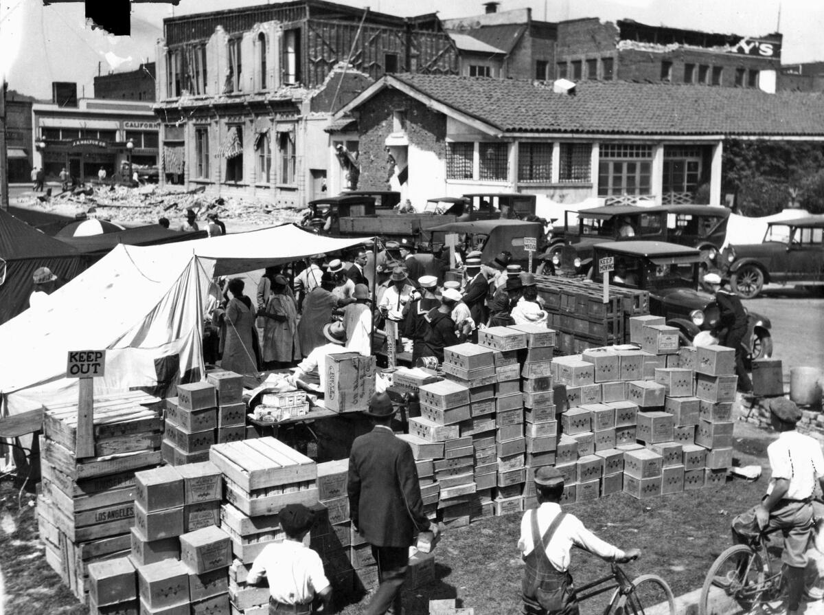 July 1, 1925: Red Cross relief workers set up outdoors in Santa Barbara following earthquake.