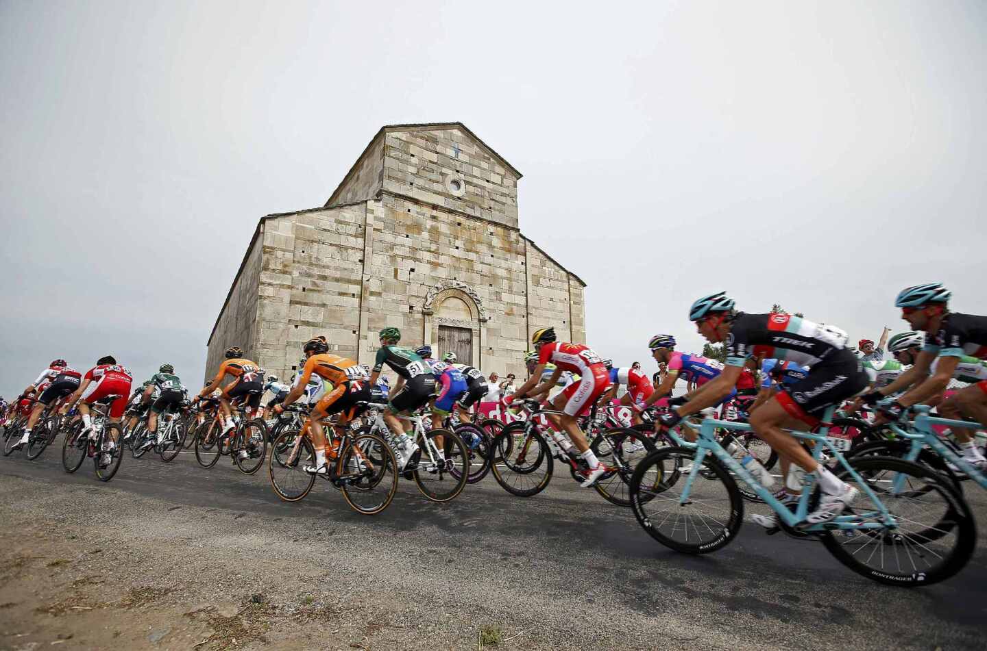 The pack of riders cycles on its way during the 213 km first stage of the centenary Tour de France cycling race from Porto-Vecchio to Bastia, on the French Mediterranean island of Corsica June 29, 2013.