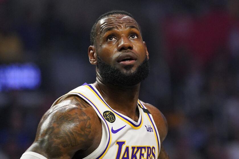 Los Angeles Lakers forward LeBron James watches for a rebound.