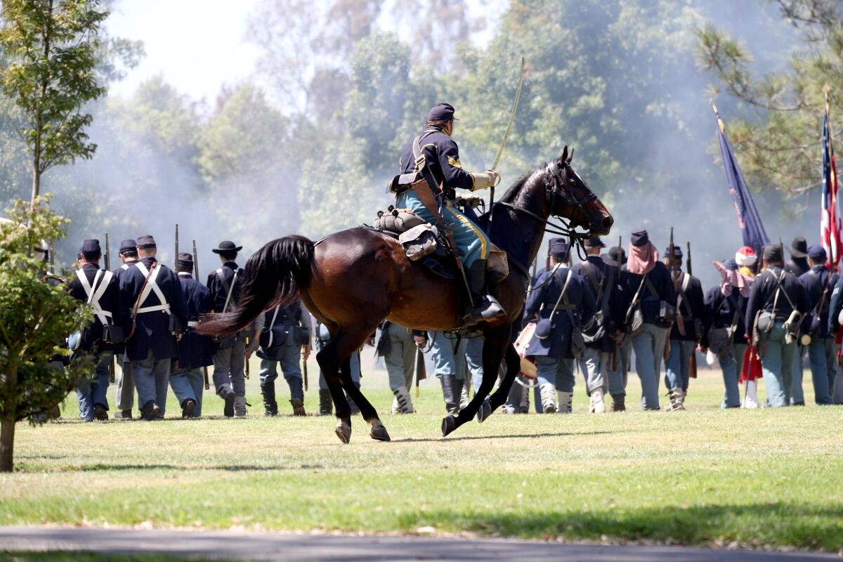 Union army rides into battle vs. the Rebel fighters at the Huntington Beach Historical Society's Civil War Days in 2019.