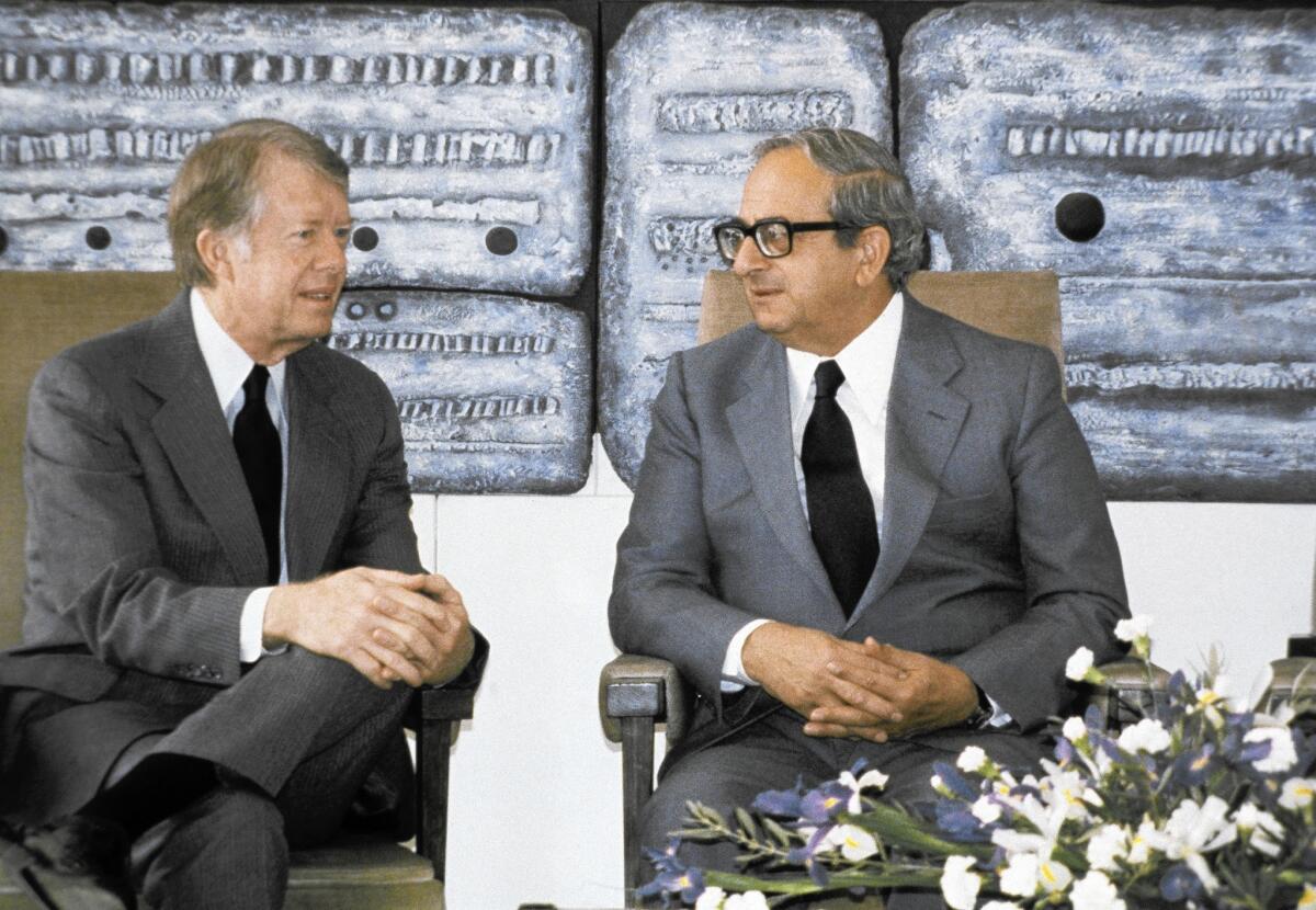 Israel's fifth president, Yitzhak Navon, right, with U.S. President Carter in 1979. Though Israel’s presidency is largely a ceremonial post, Navon was seen as a politician capable of bringing diverse people together.