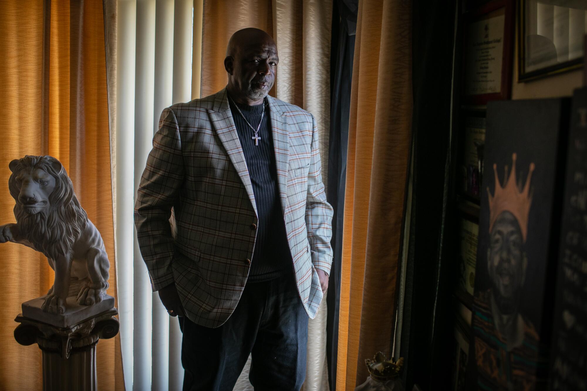 Former Lockheed worker Danny Barnes poses at his home in Los Angeles, CA. 