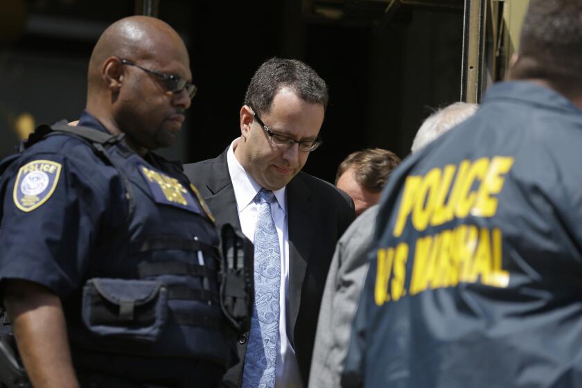 Former Subway pitchman Jared Fogle leaves the Federal Courthouse in Indianapolis on Aug. 19, 2015, after a hearing on child-pornography charges.