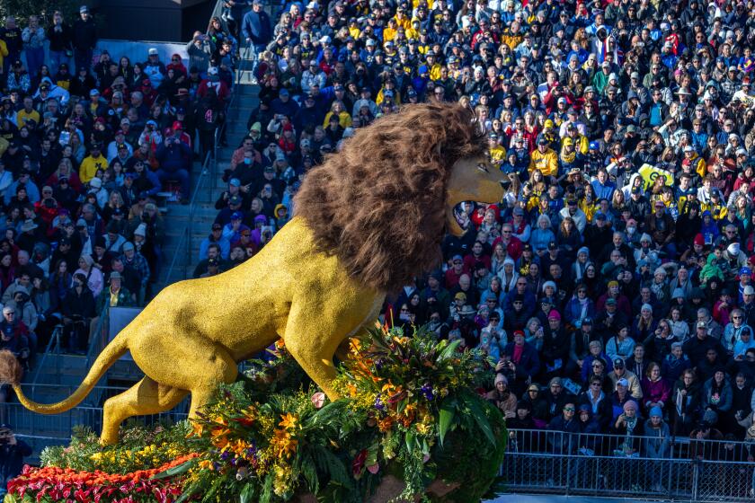 Pasadena, CA January 1, 2024: The San Diego Zoo/San Diego Zoo Safari Park float in the 135th annual New Year's Rose Parade on Monday, January 1, 2024, in Pasadena, CA. This year's parade theme is "Celebrating a World of Music: The Universal Language." (Francine Orr/ Los Angeles Times)