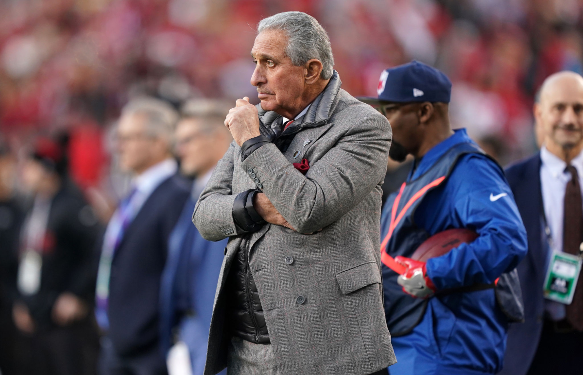 Atlanta Falcons owner Arthur Blank looks on from the sideline during a game.