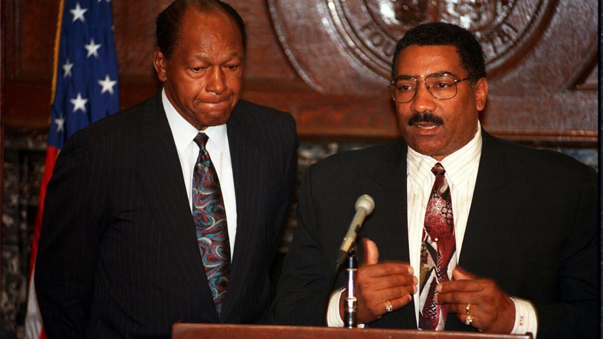 Los Angeles Police Chief Willie Williams answers questions about the city's riot preparedness as Mayor Ton Bradley listens in 1993.