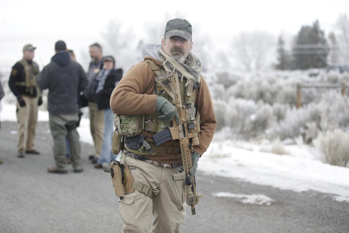A man stands guard at the Malheur National Wildlife Refuge in Oregon.