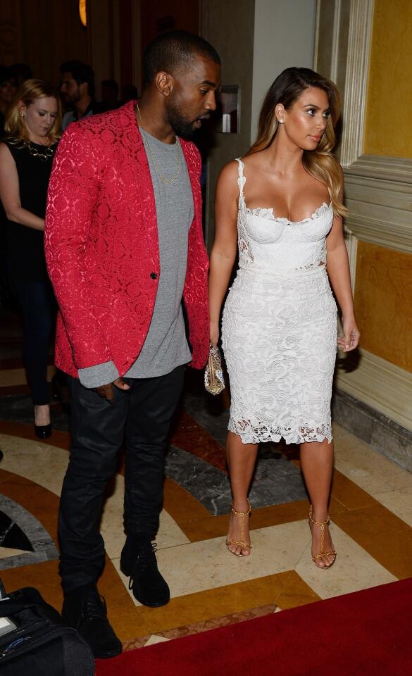 The rapper and television personality arrive at the Tao Nightclub at the Venetian Las Vegas to celebrate Kim Kardashian's 33rd birthday on Oct. 26, 2013. It was one of the couple's first public appearances since their engagement.