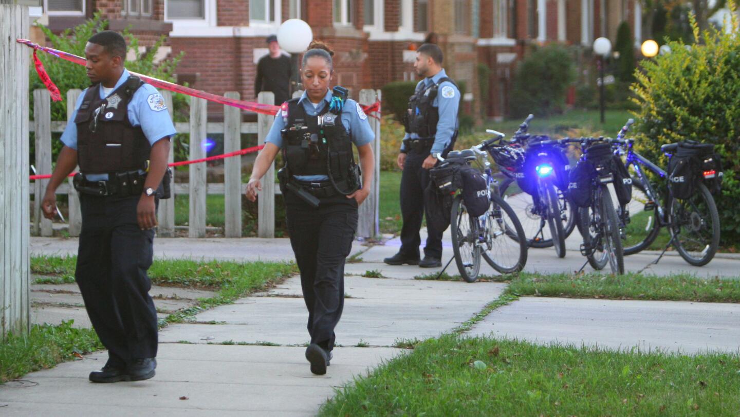 Chicago police investigate the shooting death of 9-year-old Tyshawn Lee on Monday in the 8000 block of South Damen Avenue in the Gresham neighborhood.