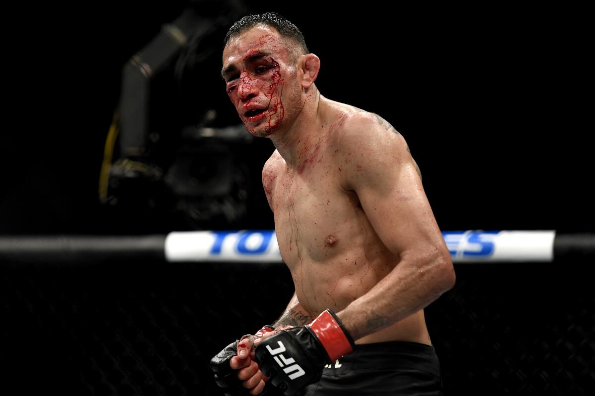 JACKSONVILLE, FLORIDA - MAY 09: Tony Ferguson of the United States looks on against Justin Gaethje of the United States after their Interim lightweight title fight during UFC 249 at VyStar Veterans Memorial Arena on May 09, 2020 in Jacksonville, Florida. (Photo by Douglas P. DeFelice/Getty Images)