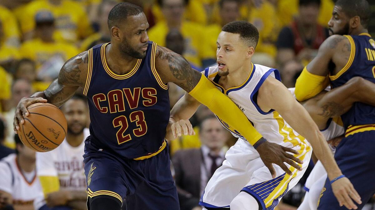 Warriors guard Stephan Curry guards Cavaliers forward LeBrone James during the 2016 NBA finals.