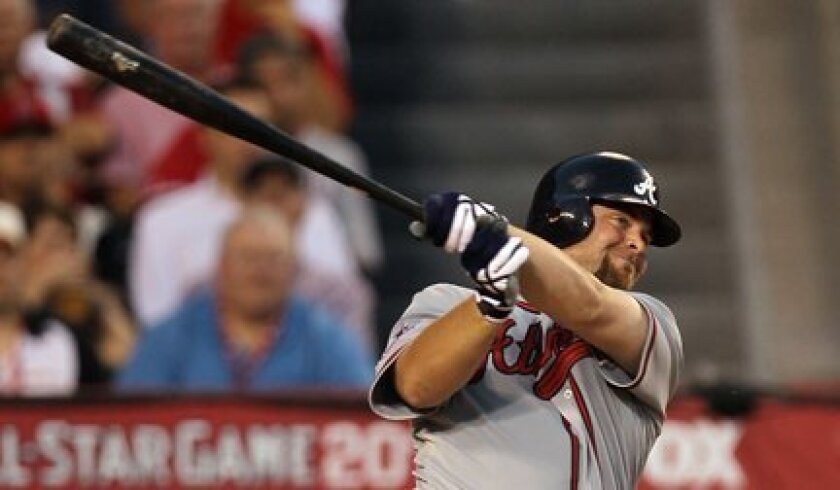 Atlanta's Brian McCann delivered the big hit of the 2010 All-Star Game, driving in all three runs for the NL.