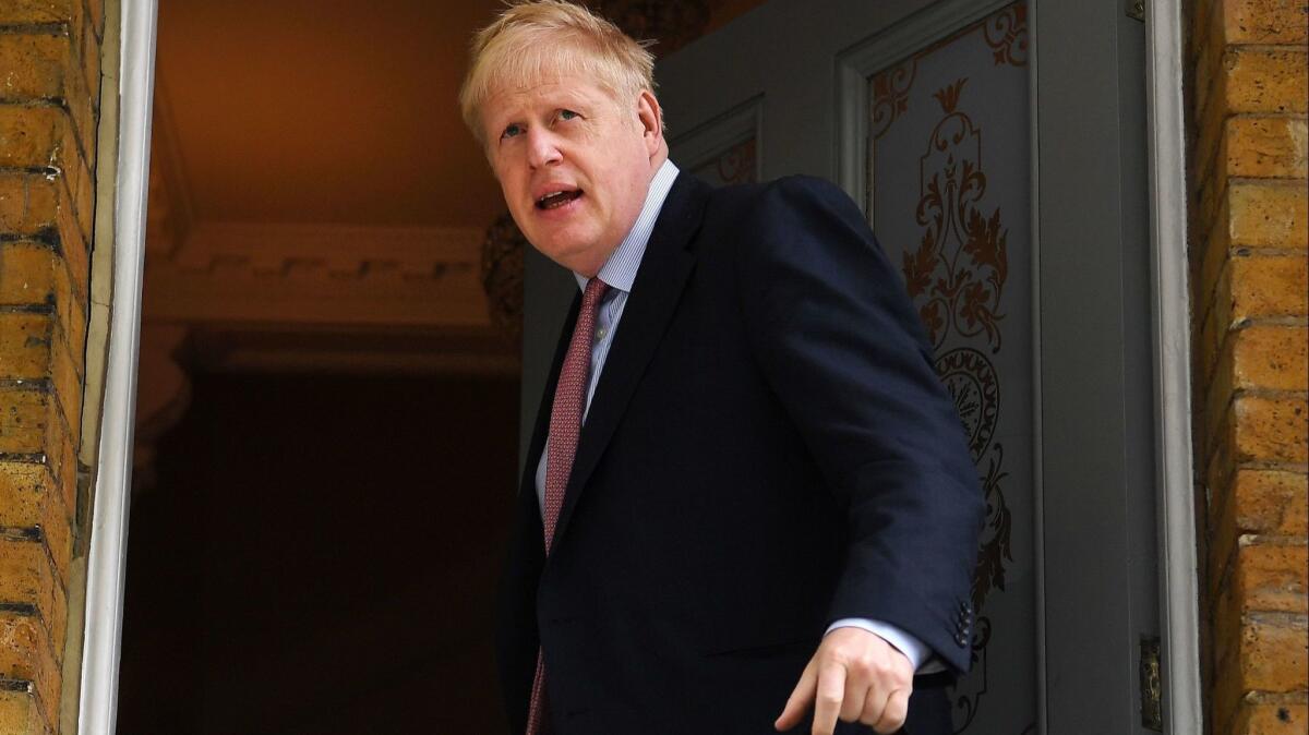 Boris Johnson departs his London home on Wednesday. The former British foreign secretary will be summoned to court over comments he made before the 2016 Brexit referendum.