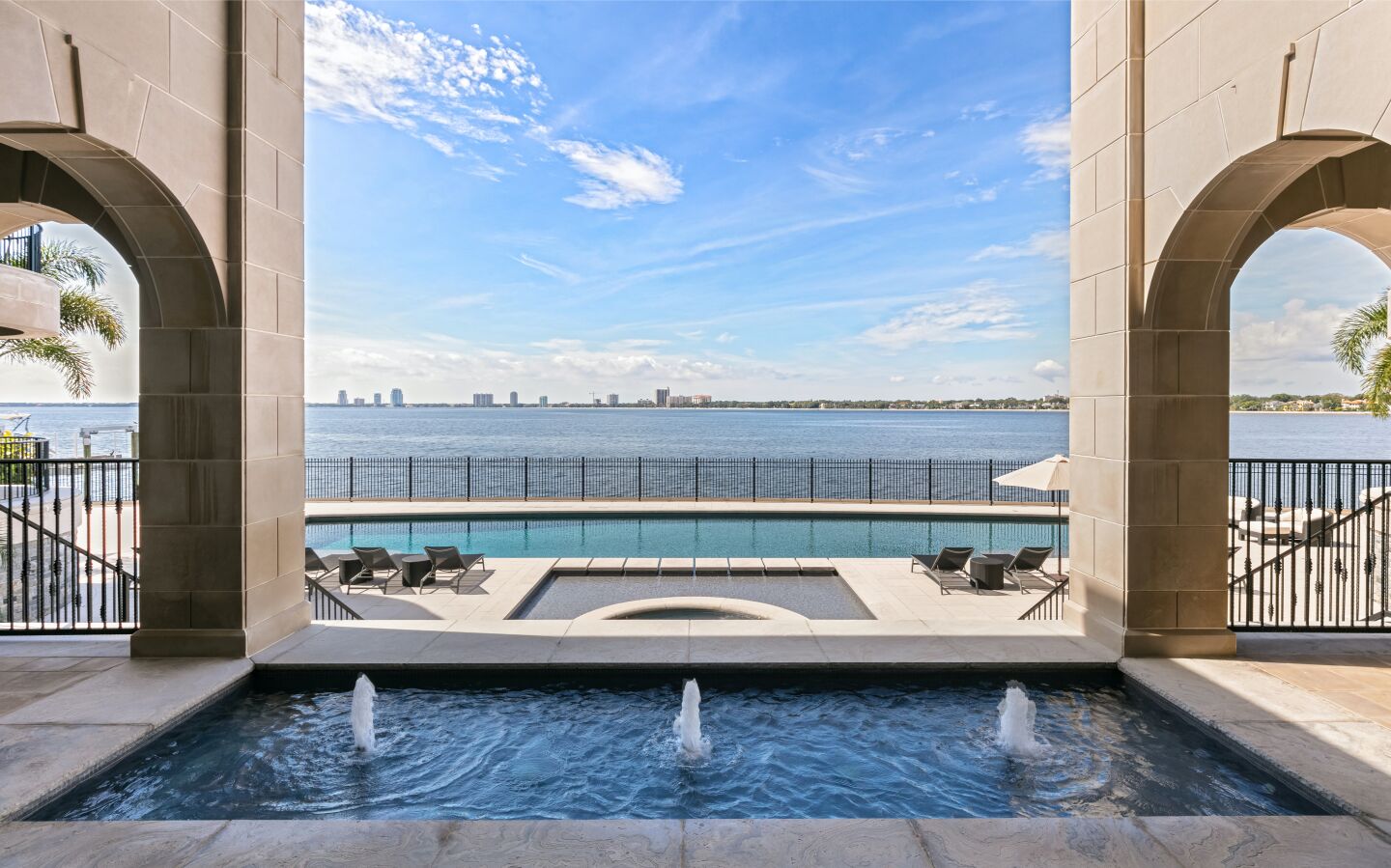 A fountain is near the pool, with views of Tampa Bay.